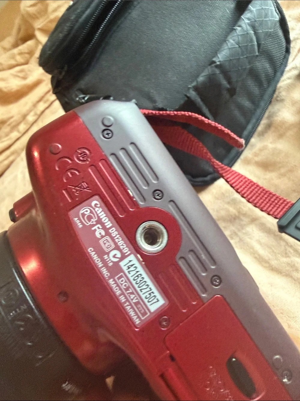 Canon Red DSLR Camera with Standard Zoom Lens